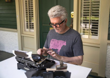 Tim Youd retyping Carson McCullers’s The Heart Is a Lonely Hunter at the Carson McCullers Center for Writers and Musicians in Columbus, Georgia, in May 2024. 