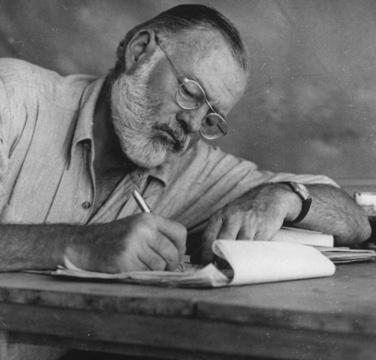 Ernest Hemingway Writing at Campsite in Kenya.