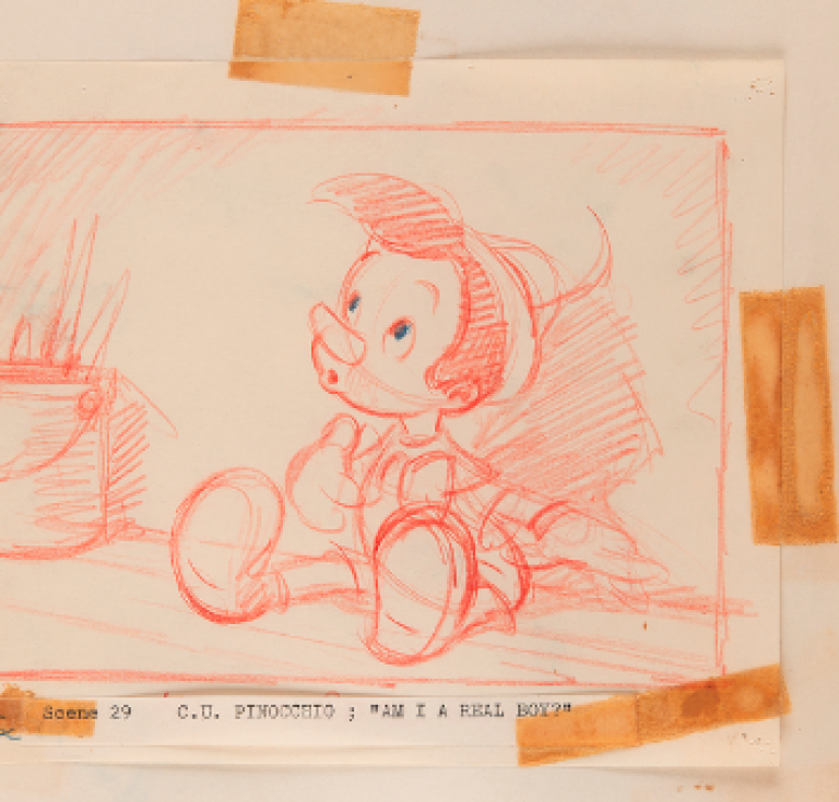 Sketch of Disney's Pinocchio in red, mounted with tape to a sketchbook page.